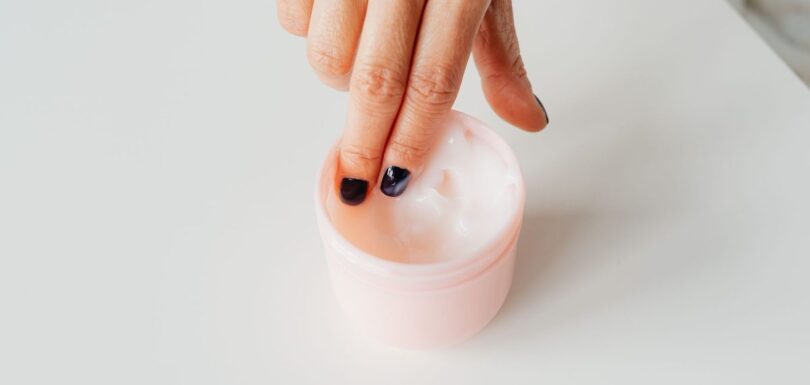 Open jar of white face cream on a neutral background, representing a moisturiser awaiting its EU safety assessment