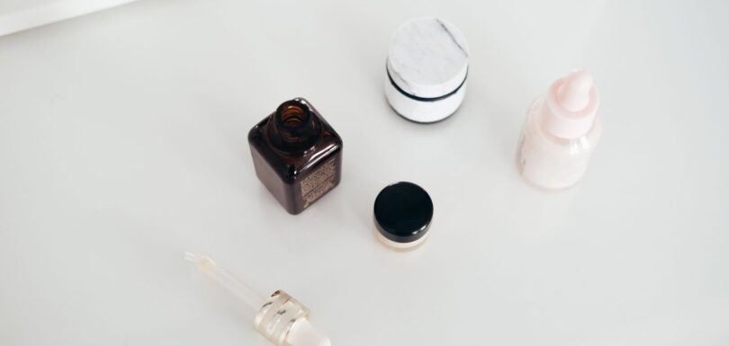 A single multi-purpose cosmetic stick on a plain surface
