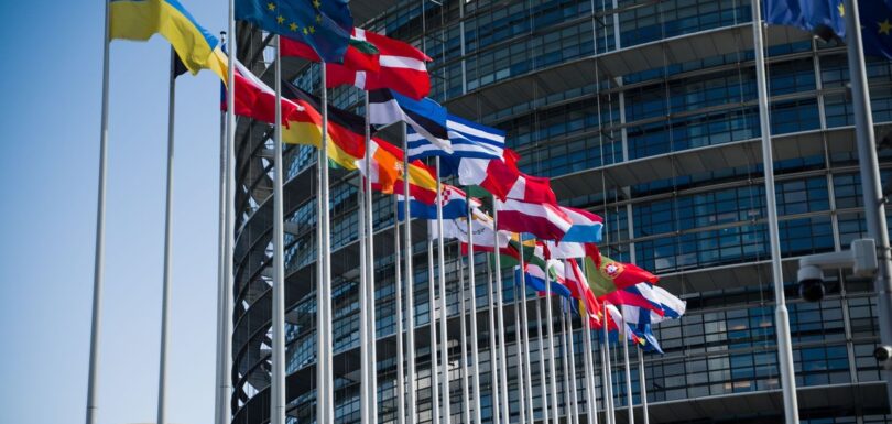 European Union flags outside the European Parliament building