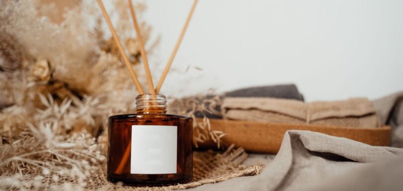 Reed diffuser with rattan sticks in a home setting